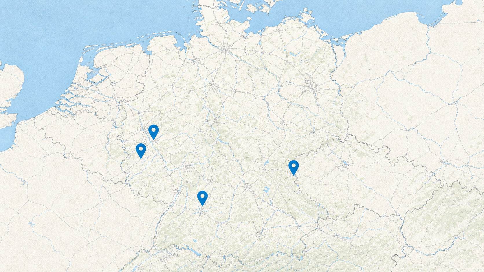 Stilisierte Deutschlandkarte mit vier markierten Vereinsstandorten